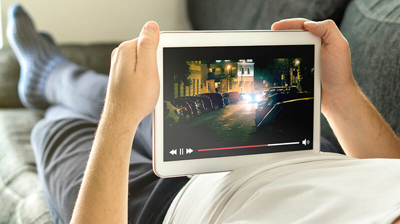 Watching a movie on a tablet