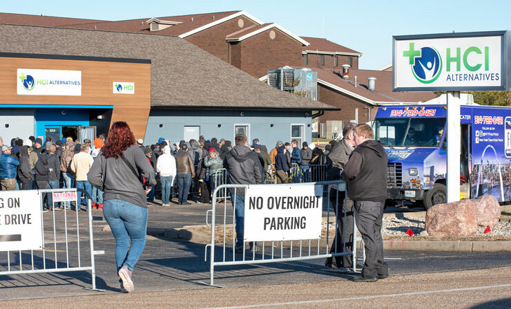 Hundreds line up outside a marijuana dispensary in Illinois