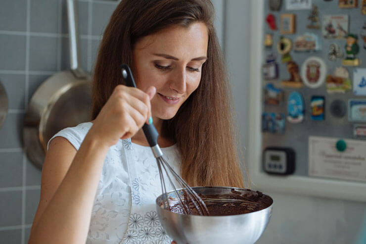 A woman baking brownies