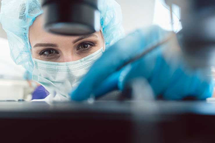 Research scientist in lab experiment