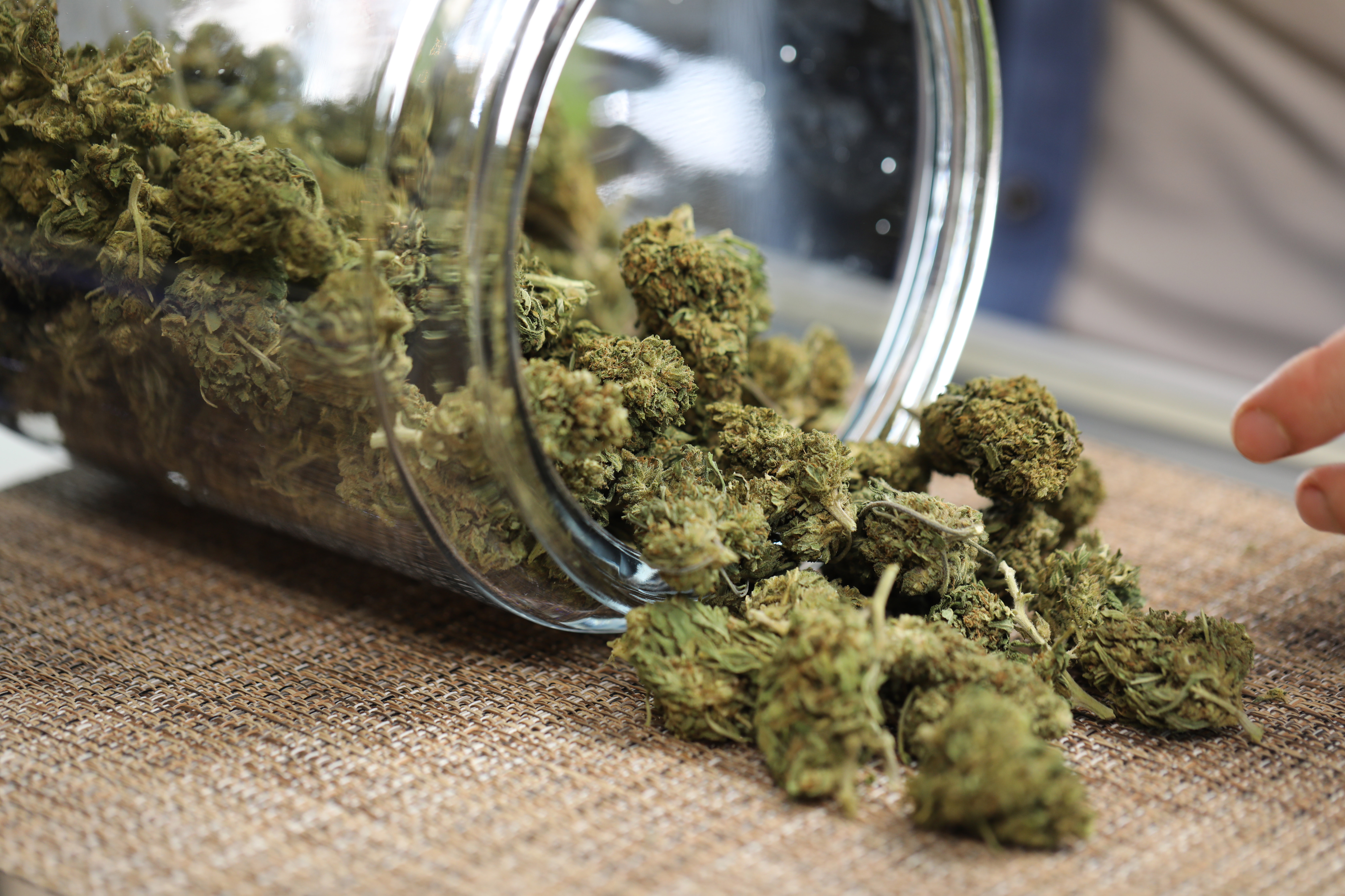 A jar of cannabis in a dispensary