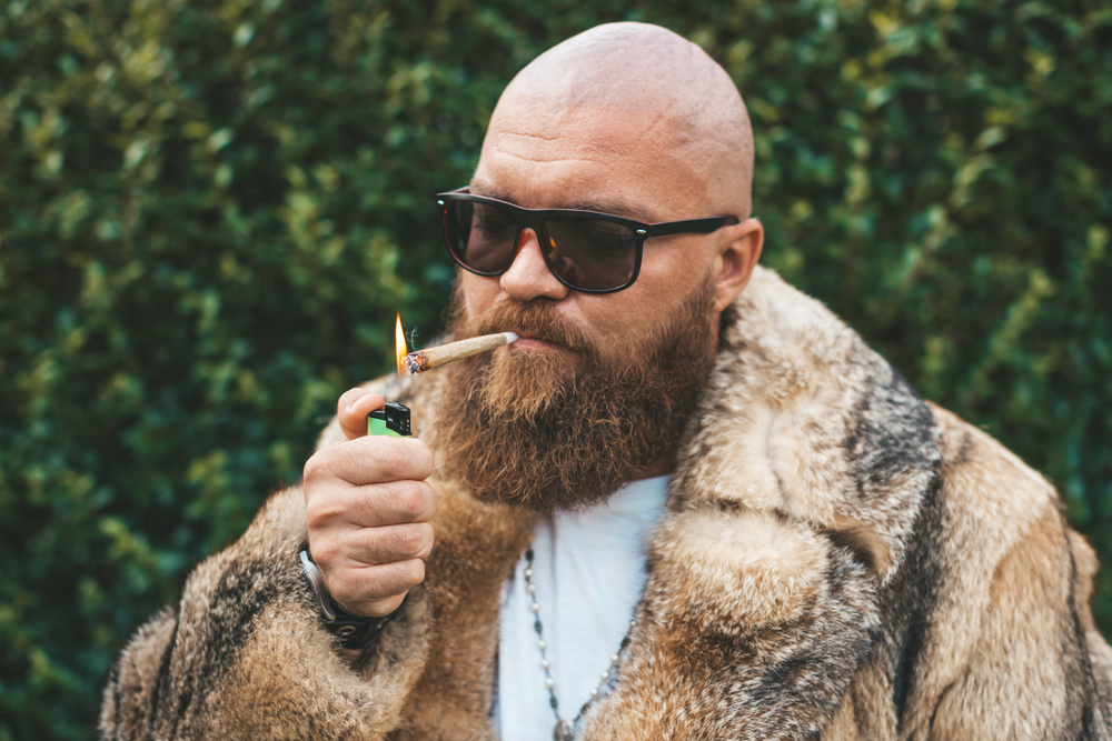 Hipster smoking a joint