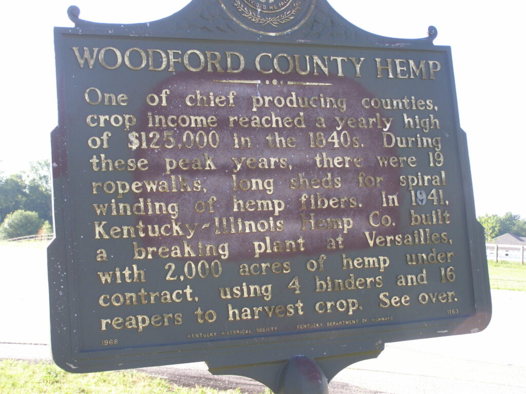 A Kentucky roadside historical marker titled Woodford County Hemp, describing the county’s 19th-century hemp industry